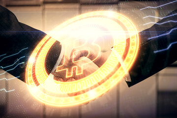 Double exposure of blockchain hologram and handshake of two men. Crypto business concept.