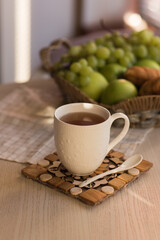 Tea with fruits in the kitchen