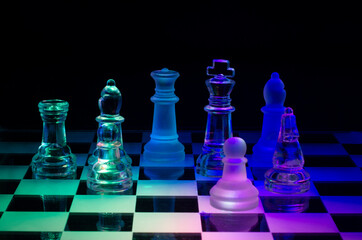 Glass chess on glass board	