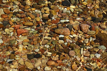 Italy: Colored stones in the sea of Sardinia.
