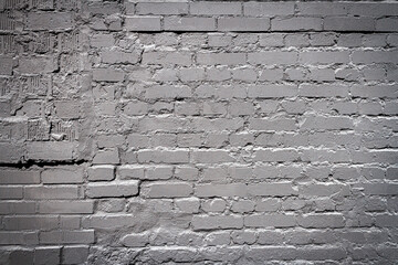 Old brick wall painted in black