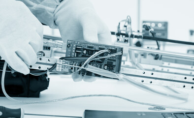 Fototapeta na wymiar Assembling CNC Laser Cutting Machine for Precision Medical Equipment Parts