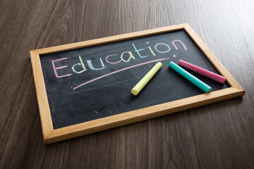 The word Education written on blackboard.