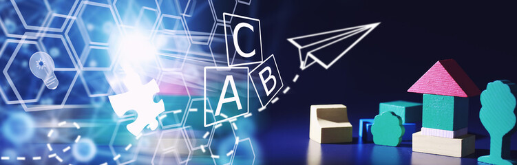 Children's development. Children's wooden toy on the table in the play area. Room of children's creativity and self-development. Wooden constructor.