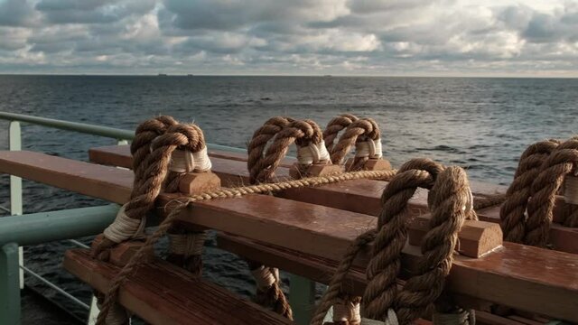 Stormtrap made of Manila rope, fixed on board the ship near the rail. The balusters are made of solid wood