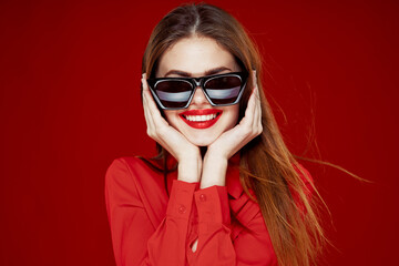 glamorous woman wearing sunglasses red shirt hairstyle model