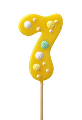 Front view of yellow handmade number seven lollipop