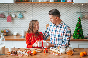 Family of dad and daughter on Christmas vacation