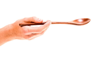 hand with wooden spoon