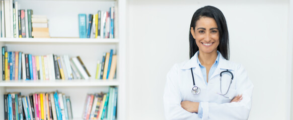 Pretty mexican female doctor with copy space