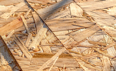 Chipboard in form of strips. Background. Particle board. Topic - advertising backgrounds of...