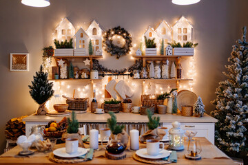electric garlands on decorated in kitchen for new year. Christmas decor.