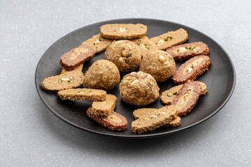 Gajak or til patti is a dry sweet cake - made of sesame seeds, ground nuts and jaggery, consumed in India  especially in winter during Makar Sankranti and Lohri festival