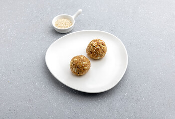 Gajak or til patti is a dry sweet cake - made of sesame seeds, ground nuts and jaggery, consumed in India  especially in winter during Makar Sankranti and Lohri festival
