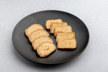 Gajak or til patti is a dry sweet cake - made of sesame seeds, ground nuts and jaggery, consumed in India  especially in winter during Makar Sankranti and Lohri festival