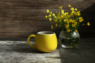 cup of coffee and flowers
