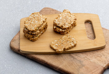 Gajak or til patti is a dry sweet cake - made of sesame seeds, ground nuts and jaggery, consumed in India  especially in winter during Makar Sankranti and Lohri festival