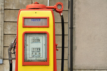 old retro  yellow and red  fuel petrol  gas pump in ireland
