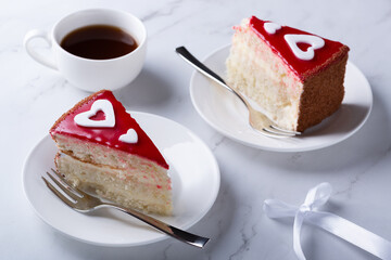 Delicious cakes for valentines day on white table