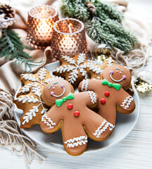 Christmas gingerbread in the plate on white. Top view..