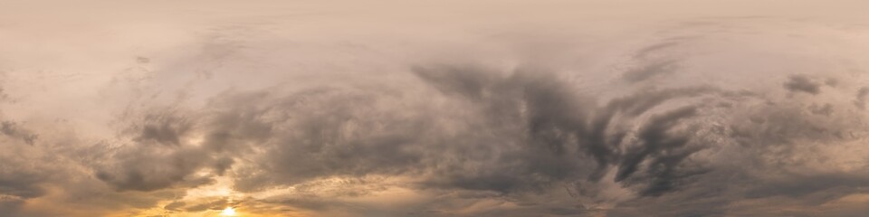 Fototapeta premium Overcast sky panorama on sunset with Cumulus clouds in Seamless spherical equirectangular format as full zenith for use in 3D graphics, game and aerial drone 360 degree panoramas for sky replacement.
