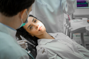 Dental examination of a young girl patient in dental clinic,Teeth health concept.