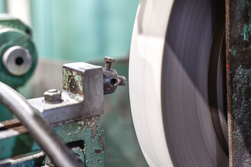 Cleaning the surface of the grinding wheel from adhesion of metal residues when grinding the...