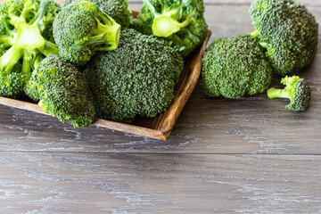 fresh broccoli close-up in a wooden dish. background with broccoli.