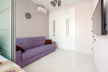 Modern studio apartment design with bedroom and living space. Hotel room, glass sliding door. City flat concept