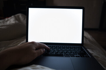 laptop white screen working in bed