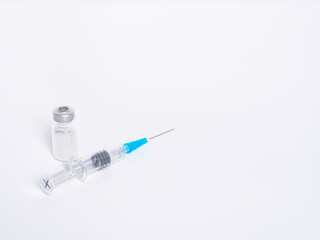 Vaccine vial with syringe