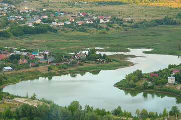 Fototapeta na wymiar Cozy village near the river