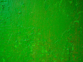 The green wall paint texture background.