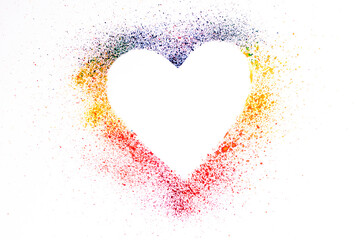 An image of a heart shape on white paper surrounded by splashes of watercolor paint of different colors.