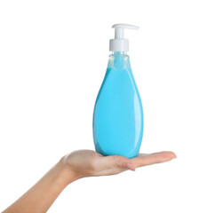Woman holding liquid soap dispenser on white background, closeup