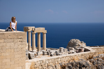 Famous tourist attraction, ruins of an ancient acropolis from the Greek empire ages, next to...