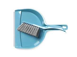 Plastic hand broom and dustpan isolated on white, top view