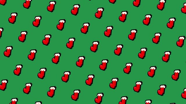 Pattern of Christmas Stockings rotating and floating in front of a green background - with alpha channel