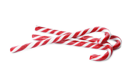 Delicious Christmas candy canes on white background
