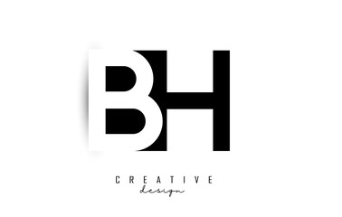 Letters BH Logo with black and white negative space design. Letters B and H with geometric typography.