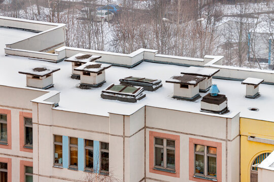 Aerial view winter flat roof kindergarten in residential district