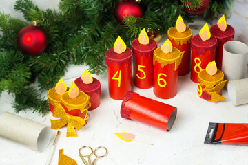 Handmade advent calendar from toilet paper tubes. Christmas candle craft step by step instruction....