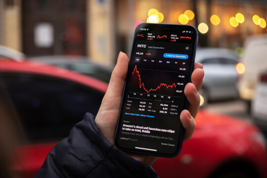 Kharkov, Ukraine - December 1, 2021: Intel Corporation INTC Stock Trade. Financial Graphs, Investment, Digital Banking Concept. Smartphone With Stock Market App In Hand