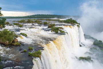 Beautiful view of a large waterfall at Iguazu Falls from brazilian side, one of the Seven Natural Wonders of the World - Foz do Iguaçu, Brazil
