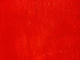 Abstract background from old red paint on the wall.