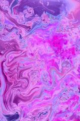 Fototapeta premium Abstract background of lilac marble with mixed paint. Acrylic texture with marble pattern. Mixing colors creates an interesting structure. It is well suited for laptop background and wallpaper, fabric