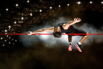 Man in action of high jump