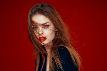 red-haired woman with red lips posing hairstyle glamor