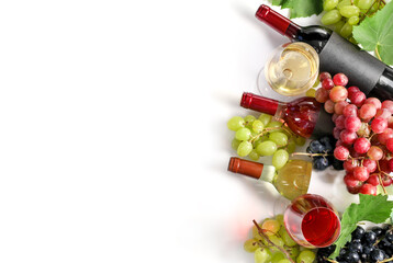 Wine in bottle, wineglasses and grape isolated on white background. Top view