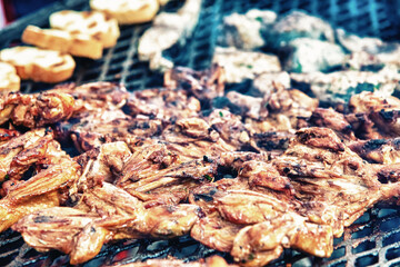 Grilled tasteful meat on a barbecue.
